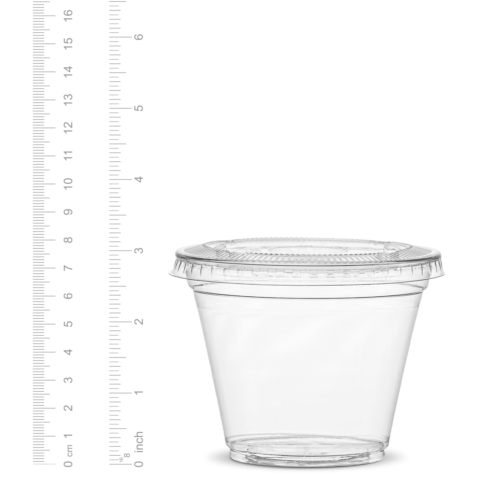 Clear 9 oz plastic cup with lid next to a ruler showing measurements